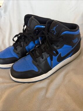 Nike Jordan 1 Mid Sneakers in Black and Blue